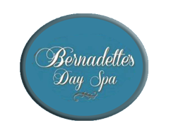 Clean, professional medical spa treatment room with neutral tones at Bernadette's Day Spa in Amesbury